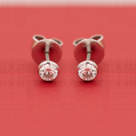 Solitaire Ohrstecker, 750er Weißgold